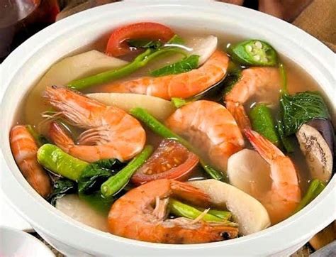  Sinigang na Hipon: Eine säuerlich-herzhafte Meeresfrüchtesuppe, die Ihre Geschmacksknospen zum Tanzen bringt!